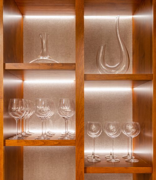 Wood shelving featuring wineglasses, decanter, part of home remodel by Sonoma County's Premier Firm for Custom Homes + Remodeling LEFF Design Build.